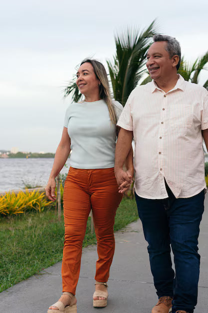 Happy couple in their 50s enjoying time together outdoors