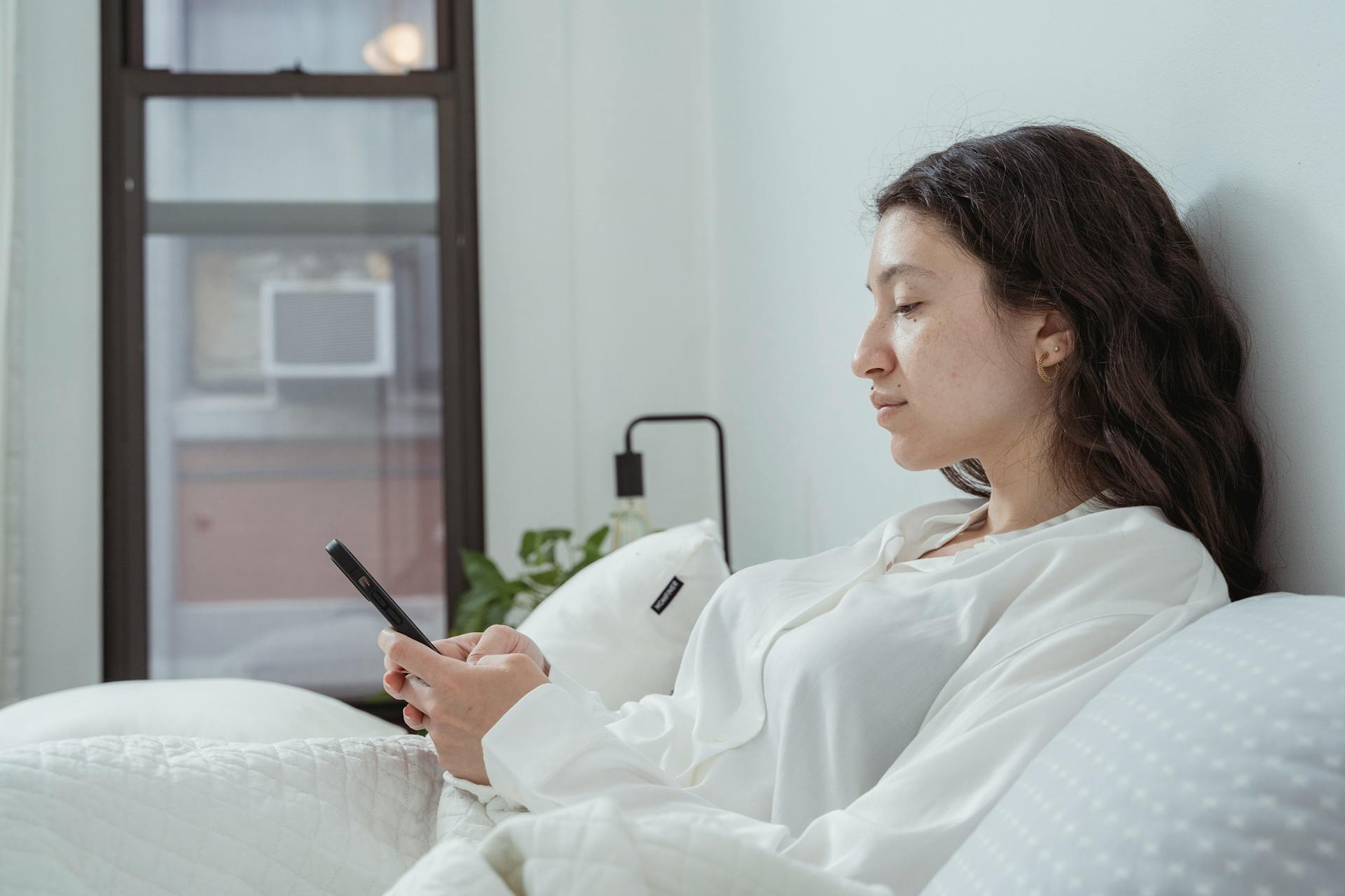Woman relaxed at bedtime — simple nightly routine